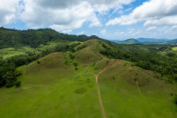 Aerial view of Green grass mountain in rainy season at Ranong, Thailand