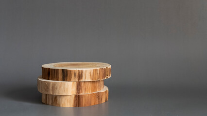 Wooden podium, Cosmetic display product stand on grey background.