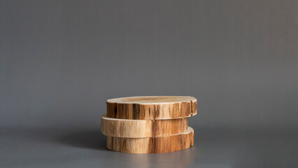 Wooden podium, Cosmetic display product stand on grey background. 