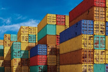 Fototapeta premium Stack of containers box, Cargo freight ship for import export logistics.