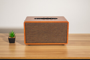 Bluetooth speakers for listening to music, watching movies, multimedia on the table.