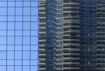 Buildings are reflected in the skyscrapers of the city of Calgary, Canada.