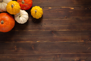 pumpkin heap at wood table as autumn still life - 634418165