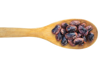 Spotted bean grains lying in a wooden spoon isolated on a transparent background. View from above.