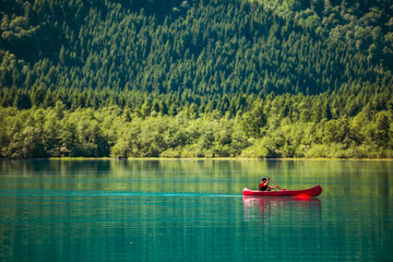 Caucasian Tourist Glacial Lake Canoeing