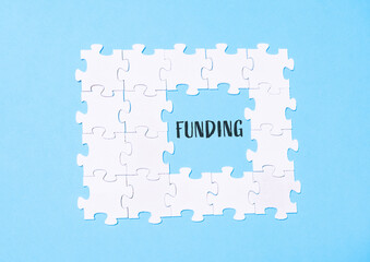 text on blue background funding