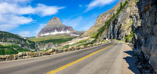 Panoramic view of Going-To-The-Sun road in Glacier National Park, Montana with Clements Mountain and the East Side tunnel in the background