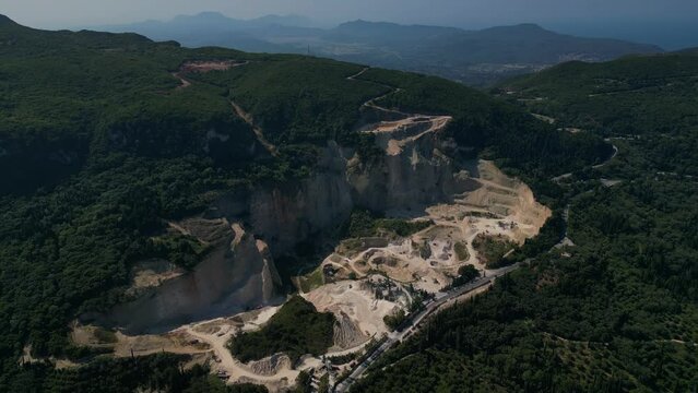 Aerial footage of the limestone quarry at Troumpeta Pass in the Arakli mountain range of NW Corfu