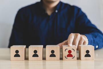 Hand choose red person with focus sign. Human resources management
