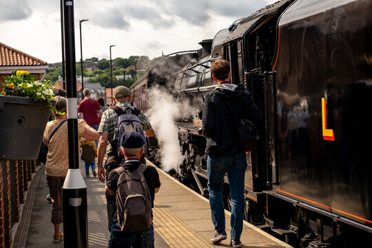 Passengers waiting to board the steam train on the North York Moors Railway