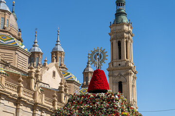  Zaragoza Spain. October 12, 2022 the Virgin of the Pilar dressed in flowers on the national day of Spain - obrazy, fototapety, plakaty