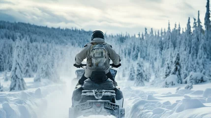 Fotobehang the huntsman rides through the winter forest on a snowmobile in the snow generative ai © Fukume