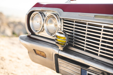 close-up of a retro car with front headlights