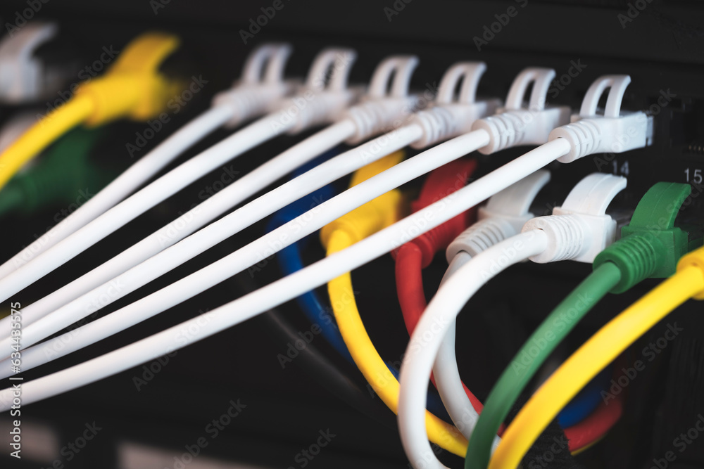 Aufkleber multi colored network cables connected to switch, network technology concept