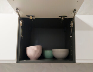Top kitchen cupboard showing dishware