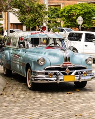 Foto op Canvas cars of the parade of vintage cars at the flower fair in medellin colombia © Daniel Ching