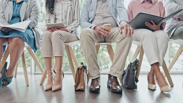 Legs, workers and waiting room for hiring, recruitment or job opportunity. Group, human resources and business people in line for onboarding, hr or career interview for employment in corporate office
