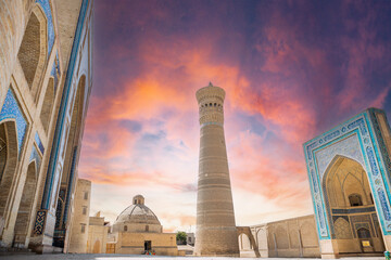 Bukhara, Uzbekistan Mir-i-Arab Madrasa Kalyan minaret and tower. Translation on mosque: 