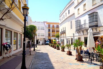 old town of Tarifa with typical white Andalusian houses, bars and restaurants, C. Sancho IV el...