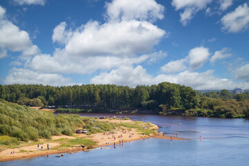 Fototapeta premium Landscape on the river in hot weather.