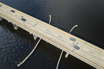 Barron Collier Bridge and Gilchrist Bridge in Florida with moving traffic. Transportation...