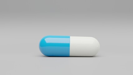 Light blue white capsule pill on a white background - Medicine healthcare medicaments