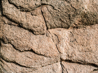 Ancient Precambrian rock illuminated by direct sunlight