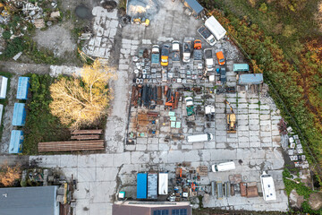 View from a height of industrial buildings on the outskirts of the city, production, processing of metal waste