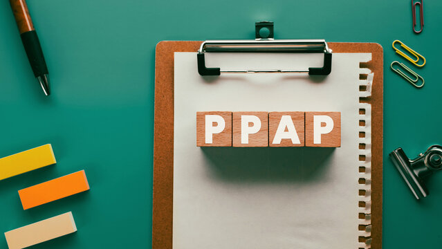 There is wood cube with the word PPAP. It is an abbreviation for PPAP as eye-catching image.