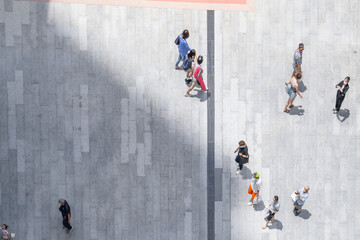 Top view crowd of people walks on a business street pedestrian in the city