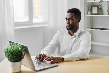 man laptop education freelancer computer american employee job african office online student