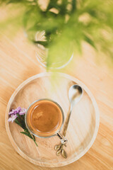 Espresso coffee in glass on wooden background, Hot drink