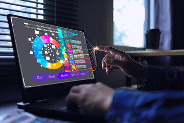Data analytic concept. data scientists is compiling complex information with monitor in office...