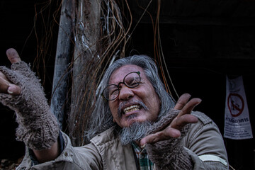 Asian homeless unconscious man no job begging for money healthy care, unemployed aged man...
