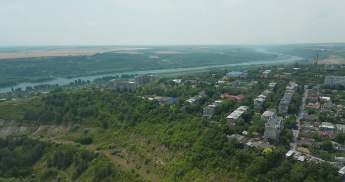 view of the Rezina city on the edge of the gorge smooth movement from the side with a view of the city and the river
