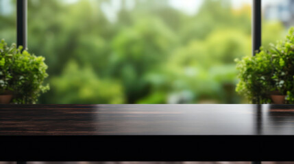Empty black table top counter desk background with and blurred park