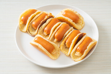 flat pancake roll with sausage