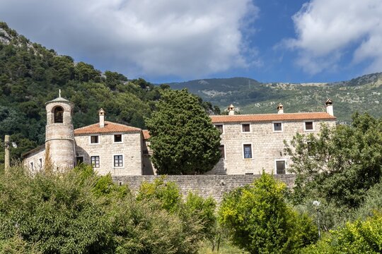 The Podmaine Monastery and a bell tower of the Church of Presentation of the Mother of God, Budva