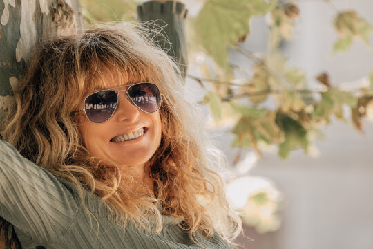 free happy relaxed middle aged woman in autumn