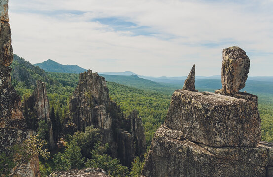 Rocks of Aigir in the smoke of a forest fire. Bashkortostan.