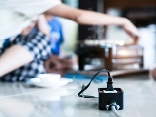 A close-up shot of an electrical outlet that facilitates home grilling.Electricity concept in daily...