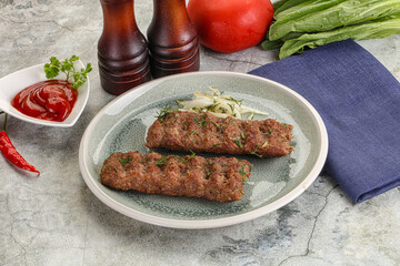 Kebab with beef served onion
