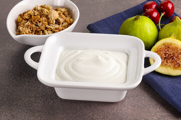 Obraz na płótnie Canvas Traditional homemade Greek yoghurt with granola