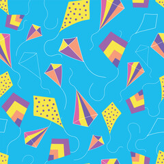 Colorful flying Kites seamless pattern on blue background.
