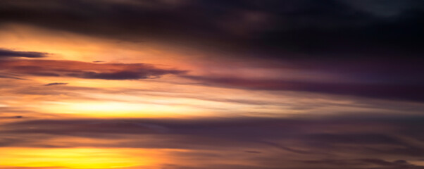 Fototapeta premium Panoramic photo sunset sky with colorful clouds