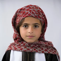 Fototapete Kinder Studio shot of a Jordanian 8-year-old in traditional wear.