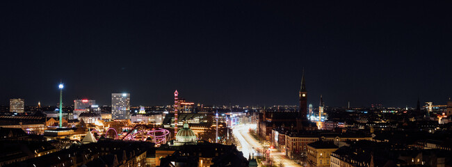 Panoramic view of Copenhagen cityscape at night