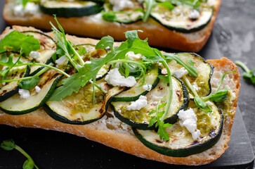 Grilled Zucchini Sandwich, Healthy Vegetarian Sandwich with Zucchini, Arugula, Feta and Pesto Sauce