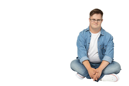 PNG,smiling young man with down syndrome in glasses, jeans and white t-shirt posing for camera,isolated on white background - Powered by Adobe