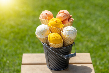 Assorted ice cream flavours in delightful waffle cones